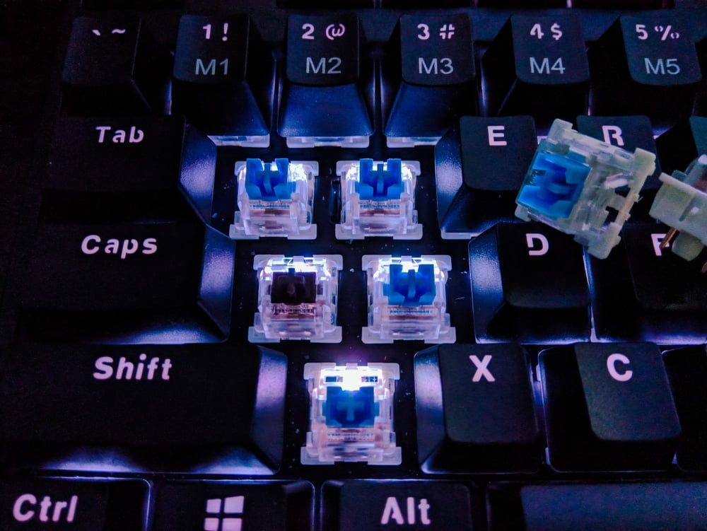 mechanical keyboard with some keycaps removed