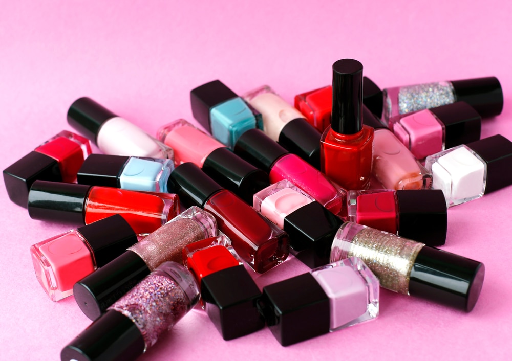 pile of bright nail polishes